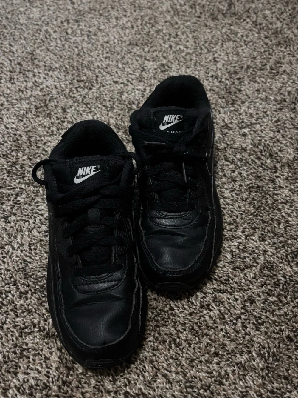 Nike Kids Black Low-Top Sneaker with Subtle Swoosh